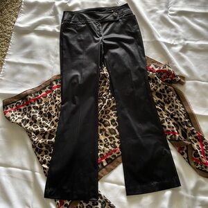 Black satin straight leg pants. INC with rhinestone button. Still has tag.